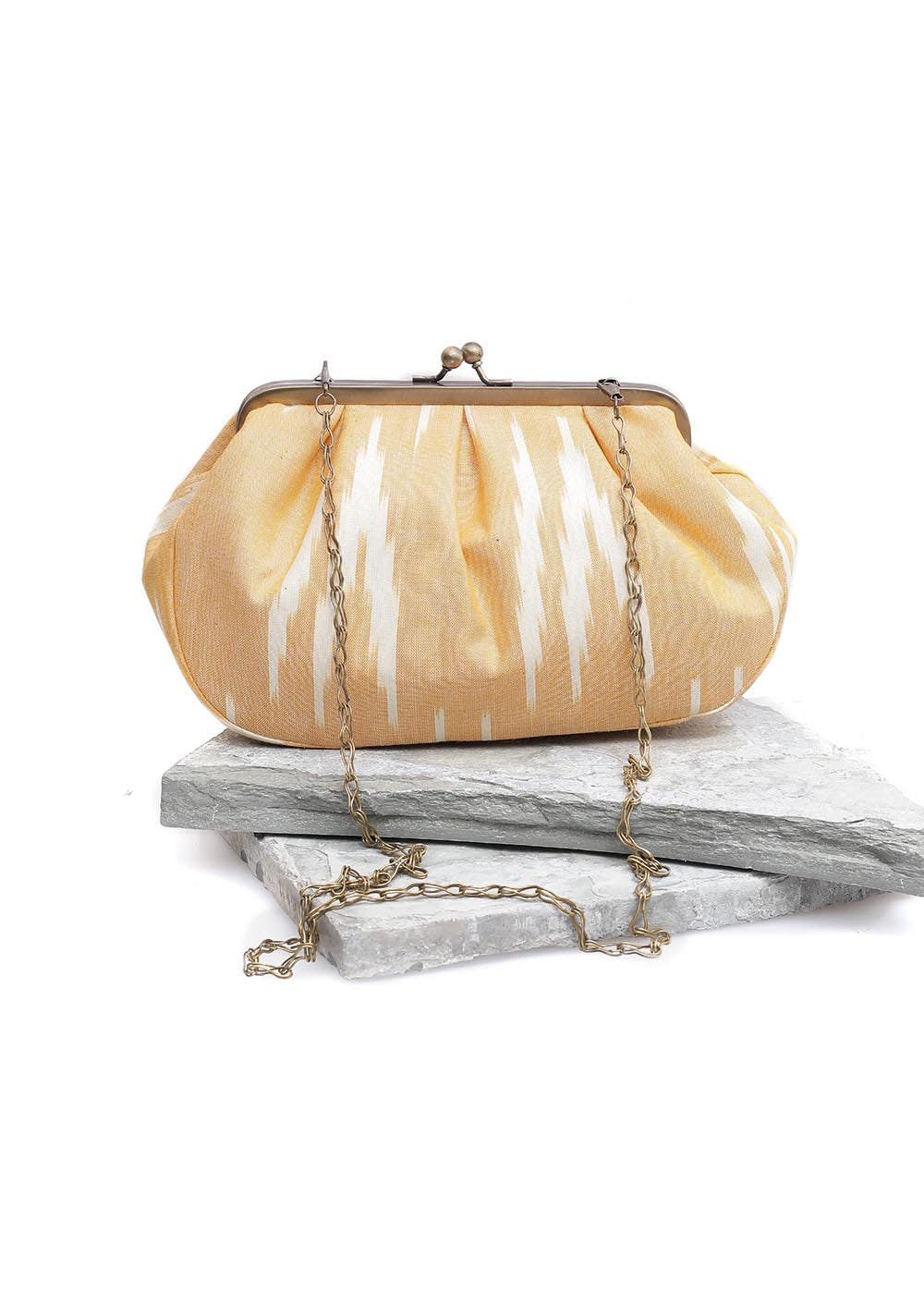Get Tuscan Yellow Ikat Clutch Bag at ₹ 2599 LBB Shop