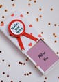 Font,Pink,Rectangle,Line,Material property,Party supply,Pattern,Stationery,Greeting card,Magenta