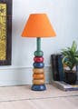 Furniture,Plant,Flowerpot,Houseplant,Orange,Wood,Picture frame,Shelving,Interior design,Shelf