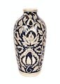 Vase,Artifact,Creative arts,Wheel,Art,Drinkware,Font,Pattern,Metal,Liquid